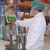 <p>Usando una plataforma de pesaje</p>
